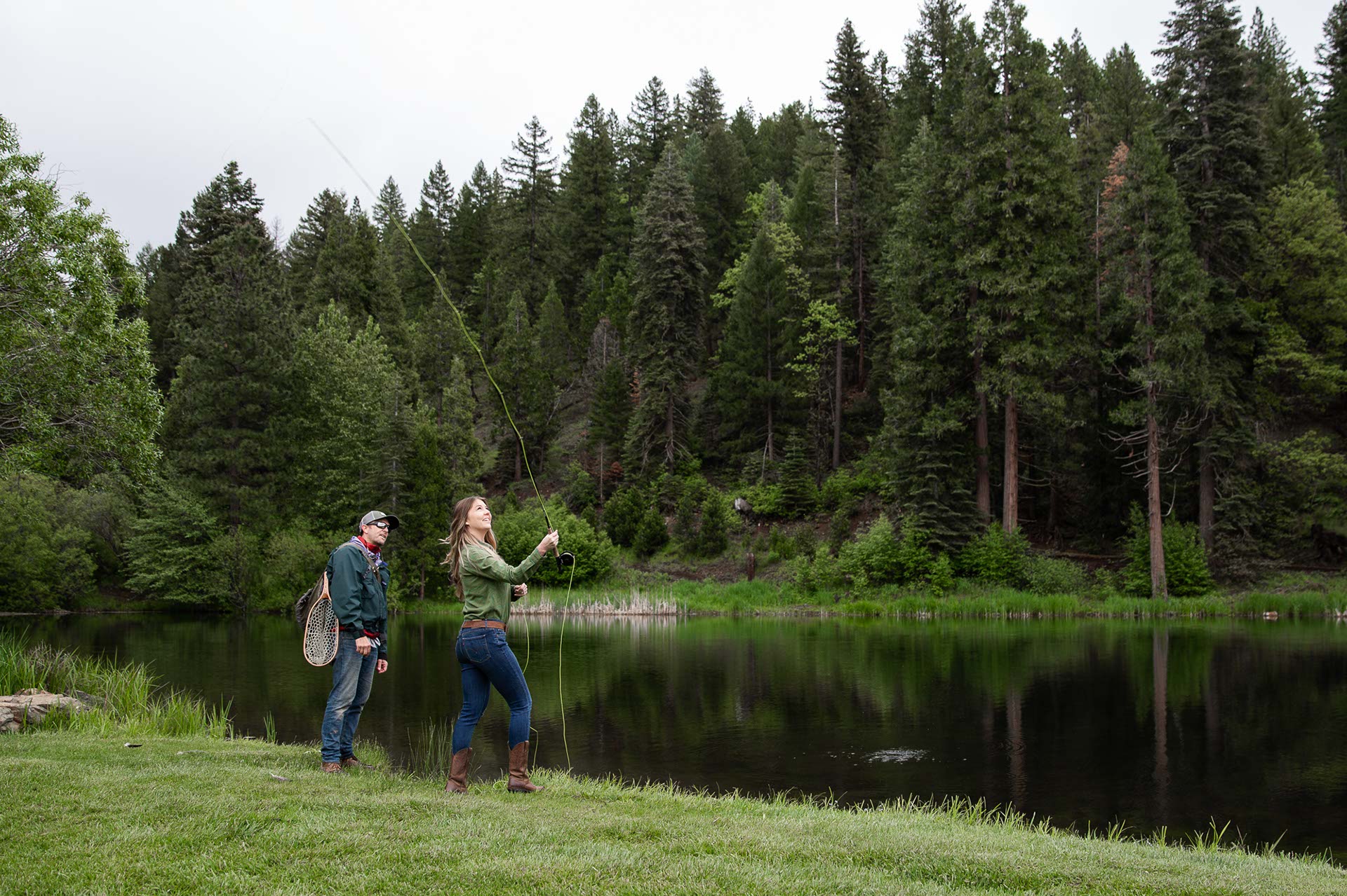 A guest learning to fly-fish with our guide